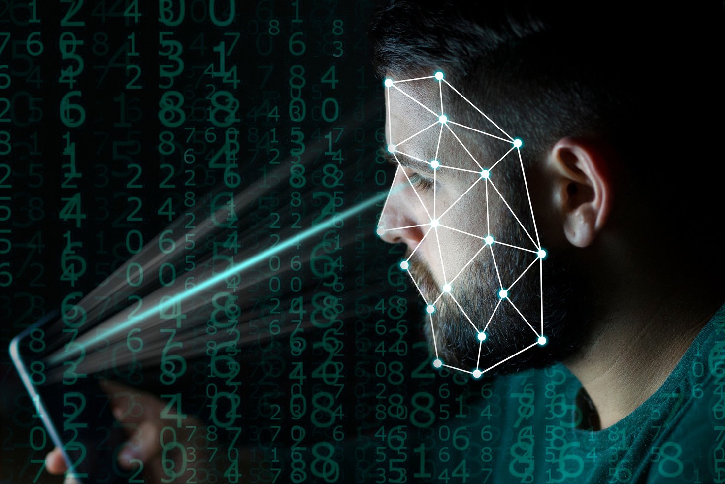 Biometrics identification and face detection verification concept. Unlocking smartphone with facial recognition technology in dark conditions.